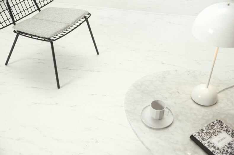 View of Marble Carrara White AVSTT40136 luxury vinyl tile by Quick-Step Livyn