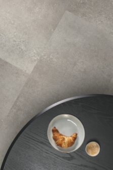 View of Concrete Rock AVSTU40234 luxury vinyl tile by Quick-Step Livyn