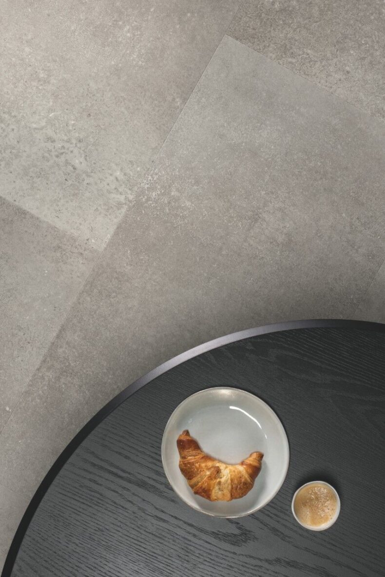 View of Concrete Rock AVSTU40234 luxury vinyl tile by Quick-Step Livyn