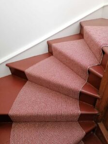 Jacquard Escargot Red stair runner by Hartley