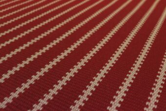 Zip Red stair runner by Hartley