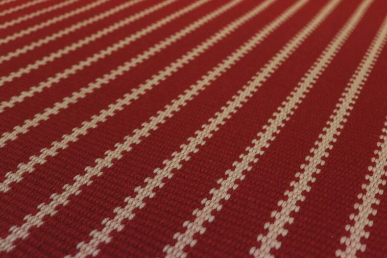 Zip Red stair runner by Hartley