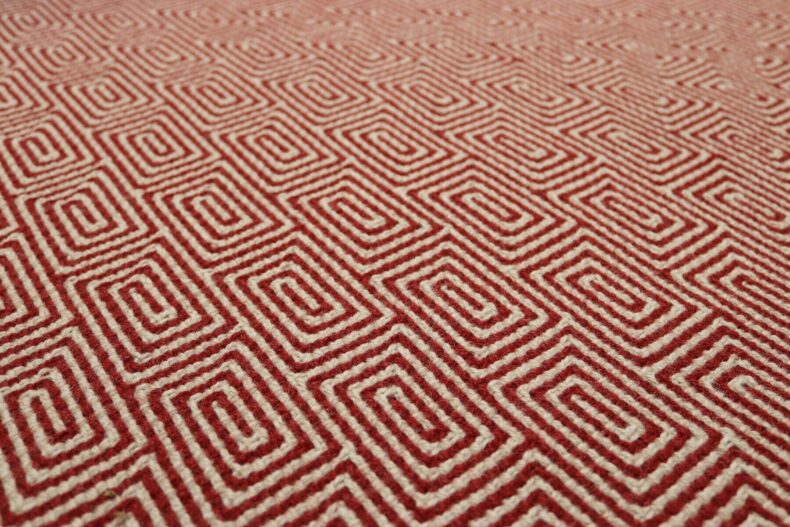 Jacquard Escargot Red stair runner by Hartley