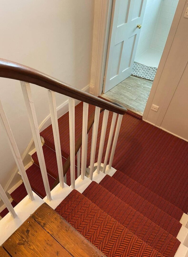 Herringbone Bright Orange stair runner by Hartley