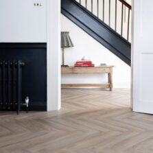 View of Rosehip Herringbone luxury vinyl tile by Harvey Maria