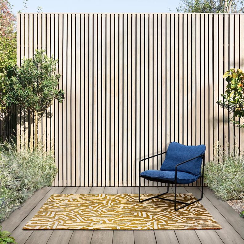 Melodic Ochre Gold Outdoor 443606 rug by Harlequin