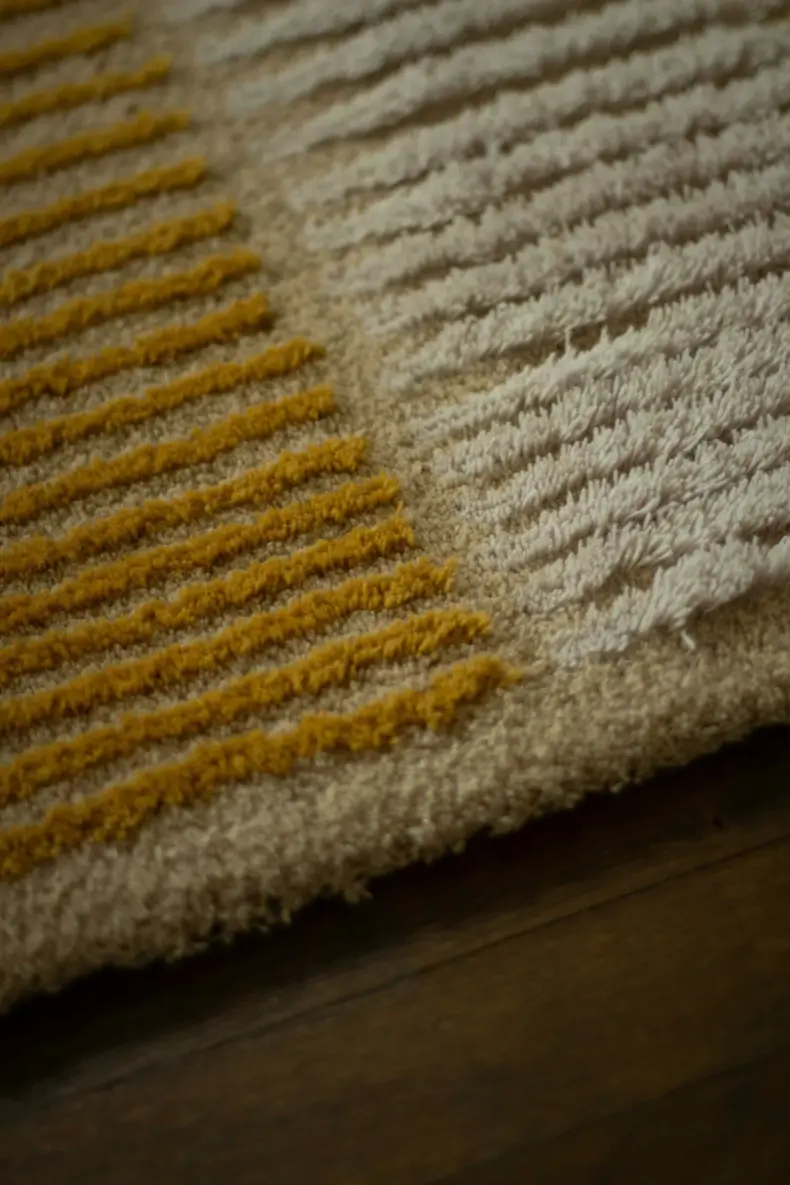 Divide rug by Roger Oates