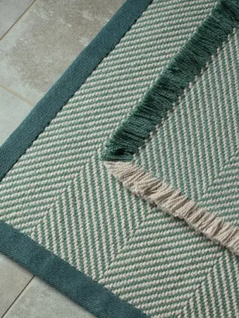 Williamsburg Teal rug by Roger Oates