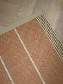 Swanson Tan rug by Roger Oates