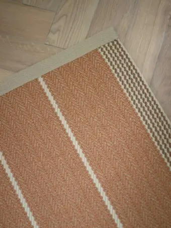 Swanson Tan rug by Roger Oates