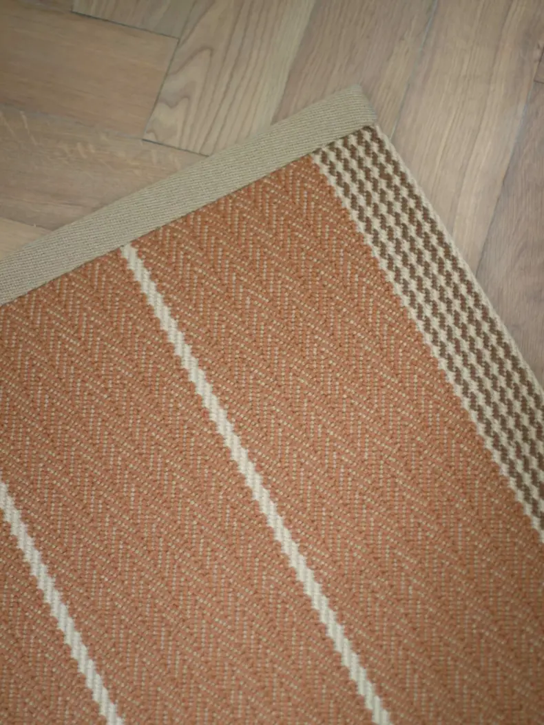 Swanson Tan rug by Roger Oates