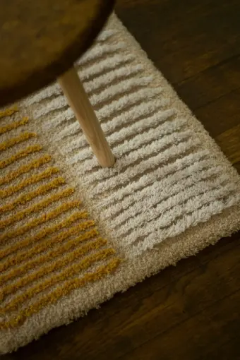 Divide rug by Roger Oates