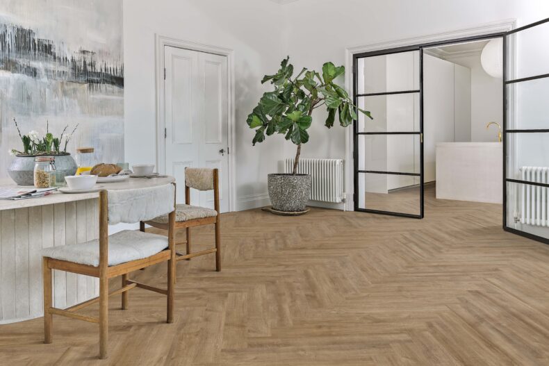 View of Sesame 5076214 (Universal 55 Herringbone) luxury vinyl tile by Victoria Design Floors
