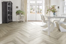 View of Fawn 5076227 (Universal 55 Herringbone) luxury vinyl tile by Victoria Design Floors