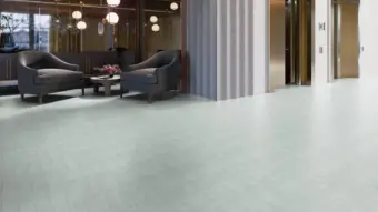 View of Stucco Haze luxury vinyl tile by Amtico