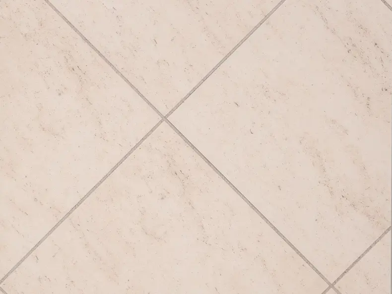 View of Honed Limestone Natural luxury vinyl tile by Amtico