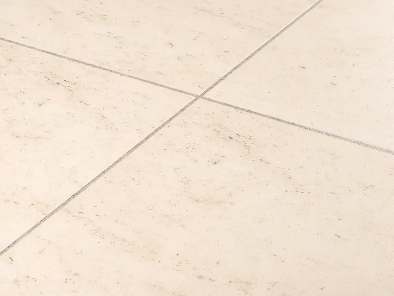 View of Honed Limestone Natural luxury vinyl tile by Amtico