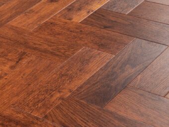 View of Priory Oak Large Parquet luxury vinyl tile by Amtico