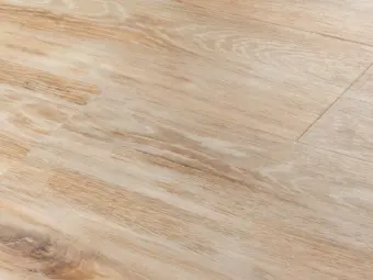 View of Lime Washed Wood Plank luxury vinyl tile by Amtico