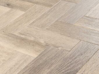 View of Friston Oak Small Parquet luxury vinyl tile by Amtico