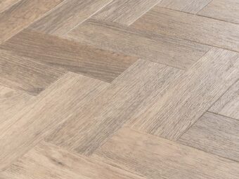 View of Hamsterley Oak Large Parquet luxury vinyl tile by Amtico