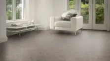 View of Native Grey Wood in Small Parquet luxury vinyl tile by Amtico