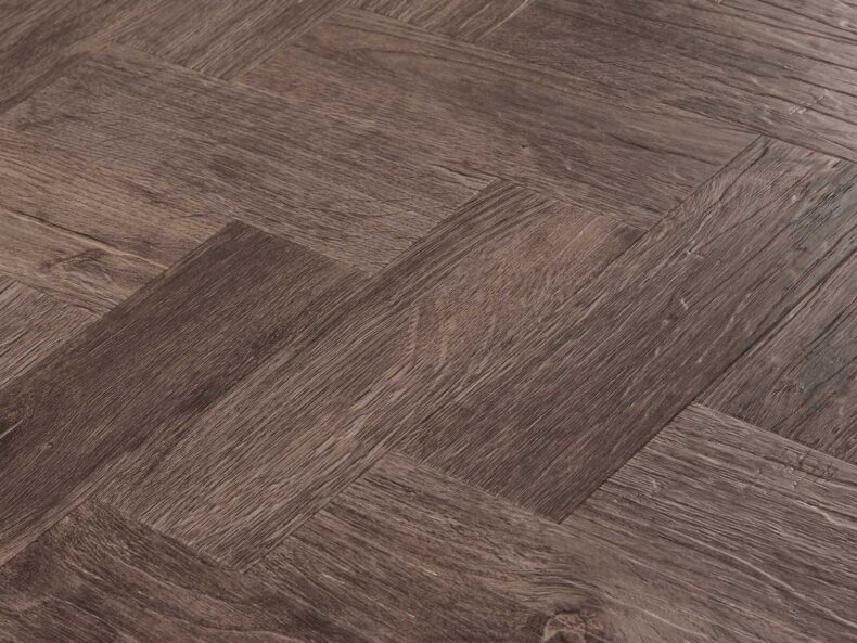 View of Native Grey Wood in Small Parquet luxury vinyl tile by Amtico