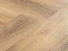 View of Larvik Oak in Small Parquet luxury vinyl tile by Amtico