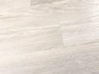 View of Dusted Oak Wide Plank luxury vinyl tile by Amtico