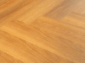 View of Spacia Honey Oak in Small Parquet luxury vinyl tile by Amtico