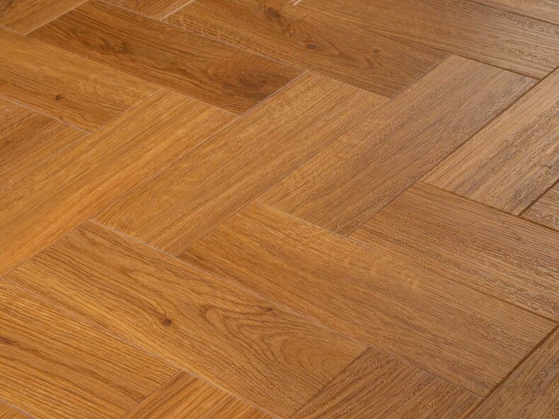 View of Spacia Traditional Oak in Small Parquet luxury vinyl tile by Amtico