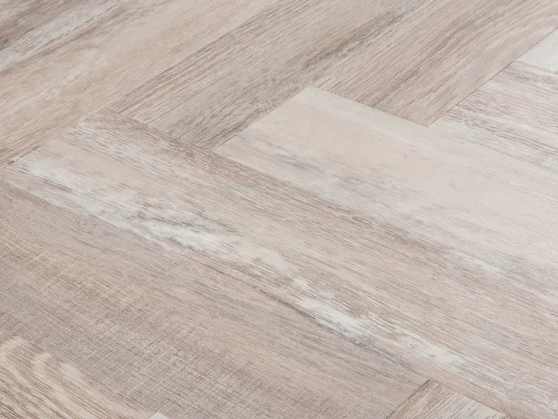 View of Spacia Washed Salvaged Timber in Large Parquet luxury vinyl tile by Amtico