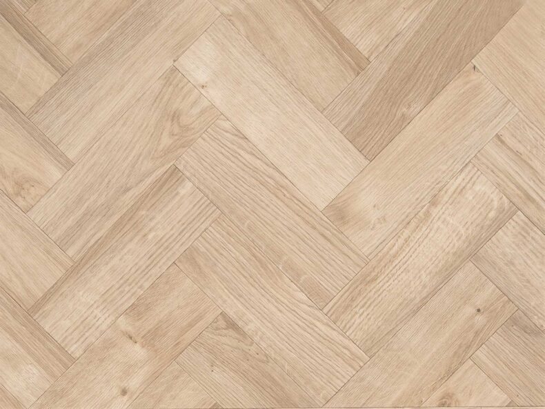 View of Spacia Sun Bleached Oak in Large Parquet luxury vinyl tile by Amtico