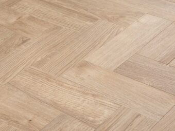View of Spacia Sun Bleached Oak in Large Parquet luxury vinyl tile by Amtico