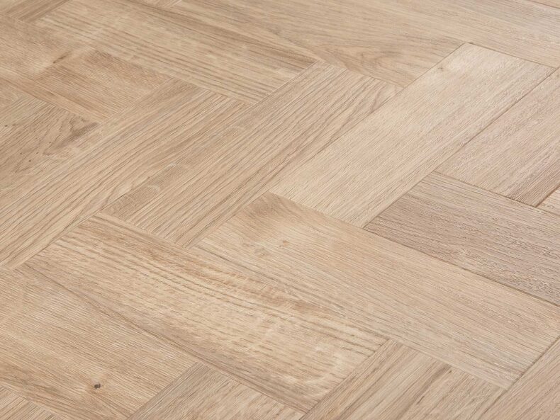 View of Spacia Sun Bleached Oak in Large Parquet luxury vinyl tile by Amtico