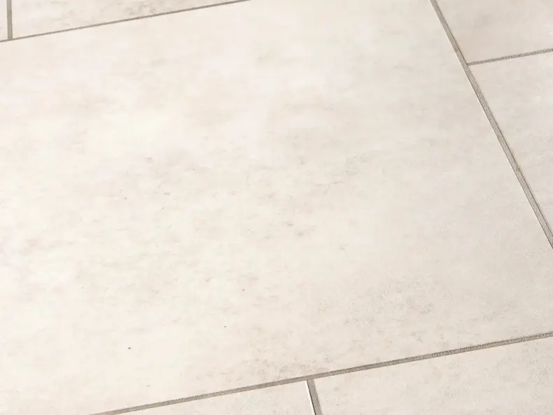View of Spacia Stanton Stone Large Square luxury vinyl tile by Amtico