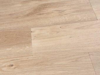 View of Spacia Sun Bleached Oak Wide Plank luxury vinyl tile by Amtico