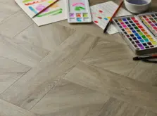 View of Dove Oak (Basketweave) luxury vinyl tile by Elements Inspirations