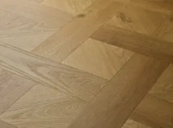 View of Natural Oak (Basketweave) luxury vinyl tile by Elements Inspirations