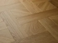 View of Golden Oak (Basketweave) luxury vinyl tile by Elements Inspirations