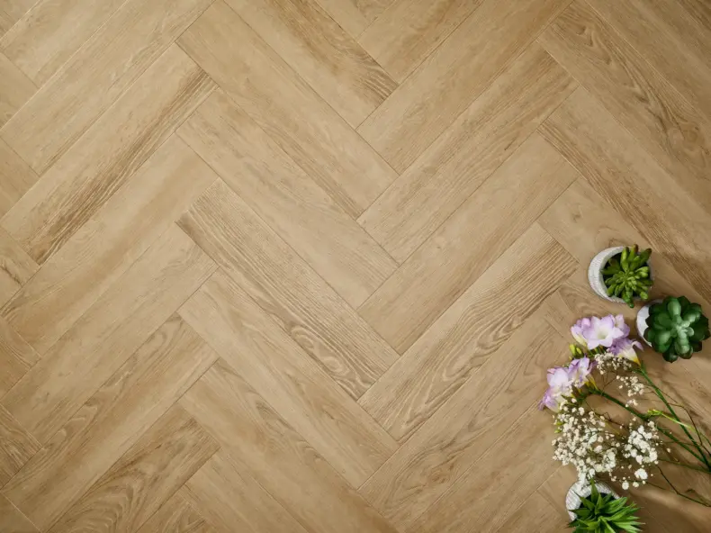 View of Sandy Oak (Herringbone) luxury vinyl tile by Elements Inspirations