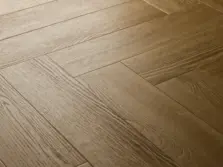 View of Sandy Oak (Herringbone) luxury vinyl tile by Elements Inspirations