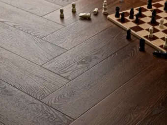 View of Mahogany (Herringbone) luxury vinyl tile by Elements Inspirations