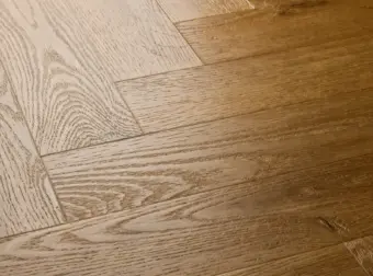 View of Barn Oak (Herringbone) luxury vinyl tile by Elements Inspirations