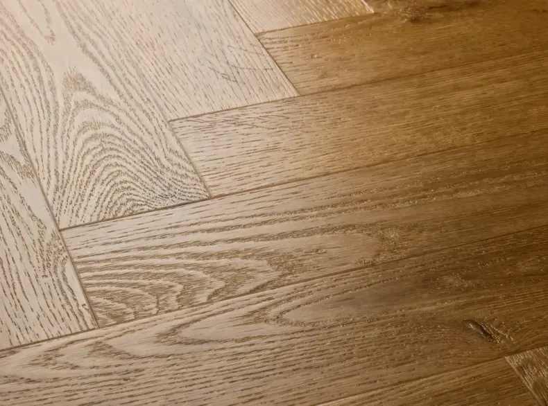 View of Barn Oak (Herringbone) luxury vinyl tile by Elements Inspirations