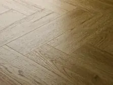 View of Classic Oak (Herringbone) luxury vinyl tile by Elements Inspirations