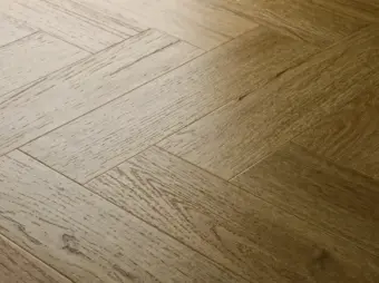 View of Classic Oak (Herringbone) luxury vinyl tile by Elements Inspirations