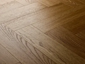 View of Golden Oak (Herringbone) luxury vinyl tile by Elements Inspirations