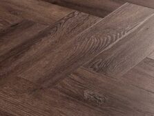 View of Tudor Oak (Herringbone) luxury vinyl tile by Textures LVT