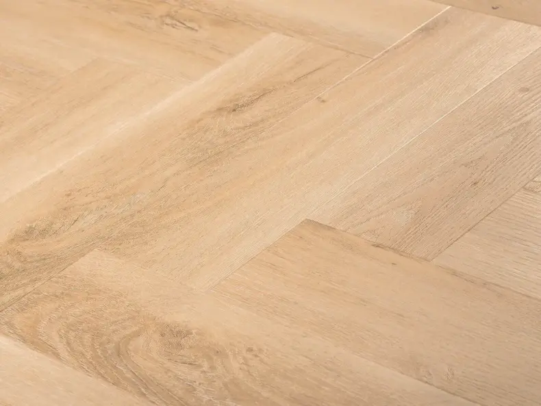 View of Washed Oak (Herringbone) luxury vinyl tile by Textures LVT